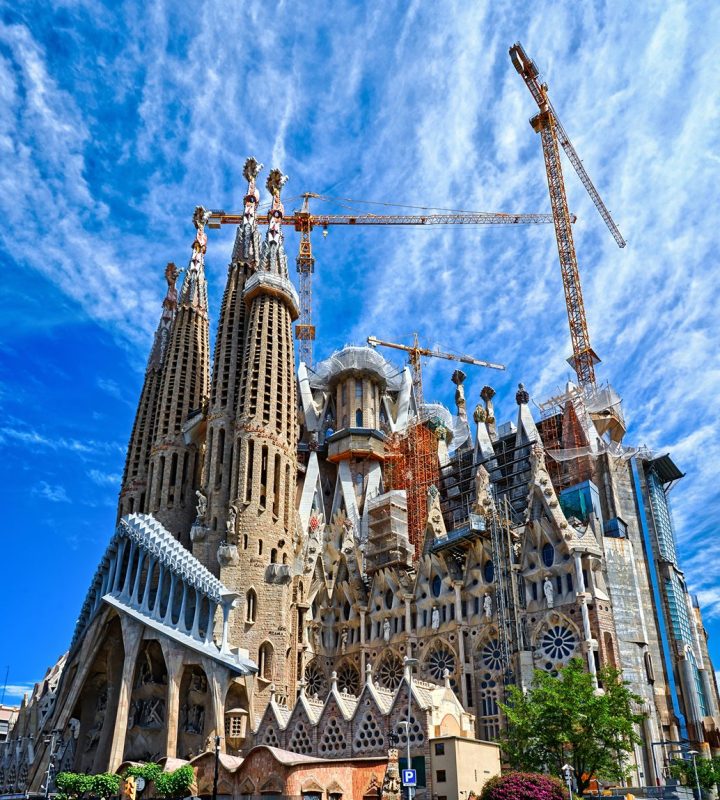 BARCELONA, SPAIN - MAY 13, 2017: View of the Expiatory Temple of the Holy Family (Sagrada Familia) with a beautiful blue sky.