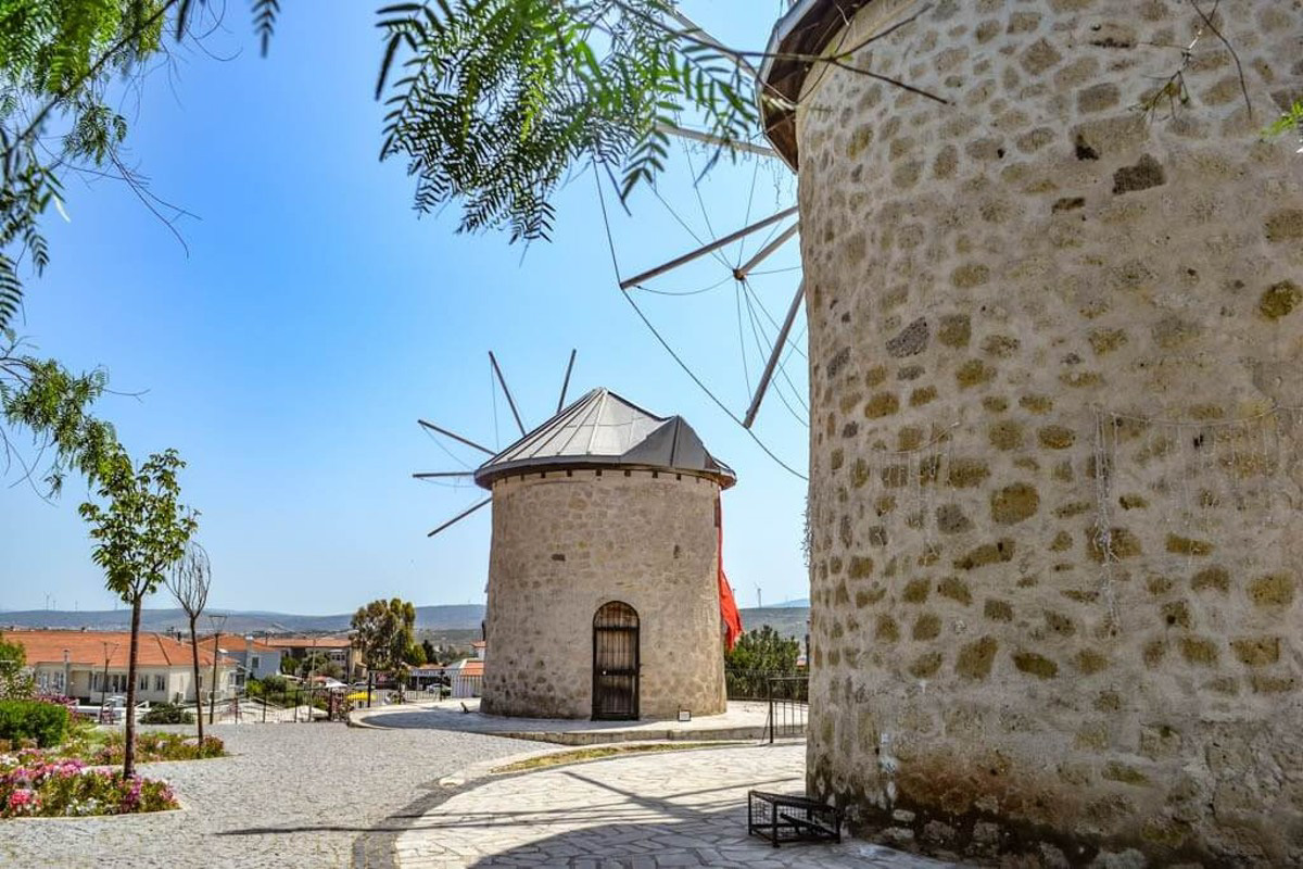 Windmills in Alcati, with bright blue skies