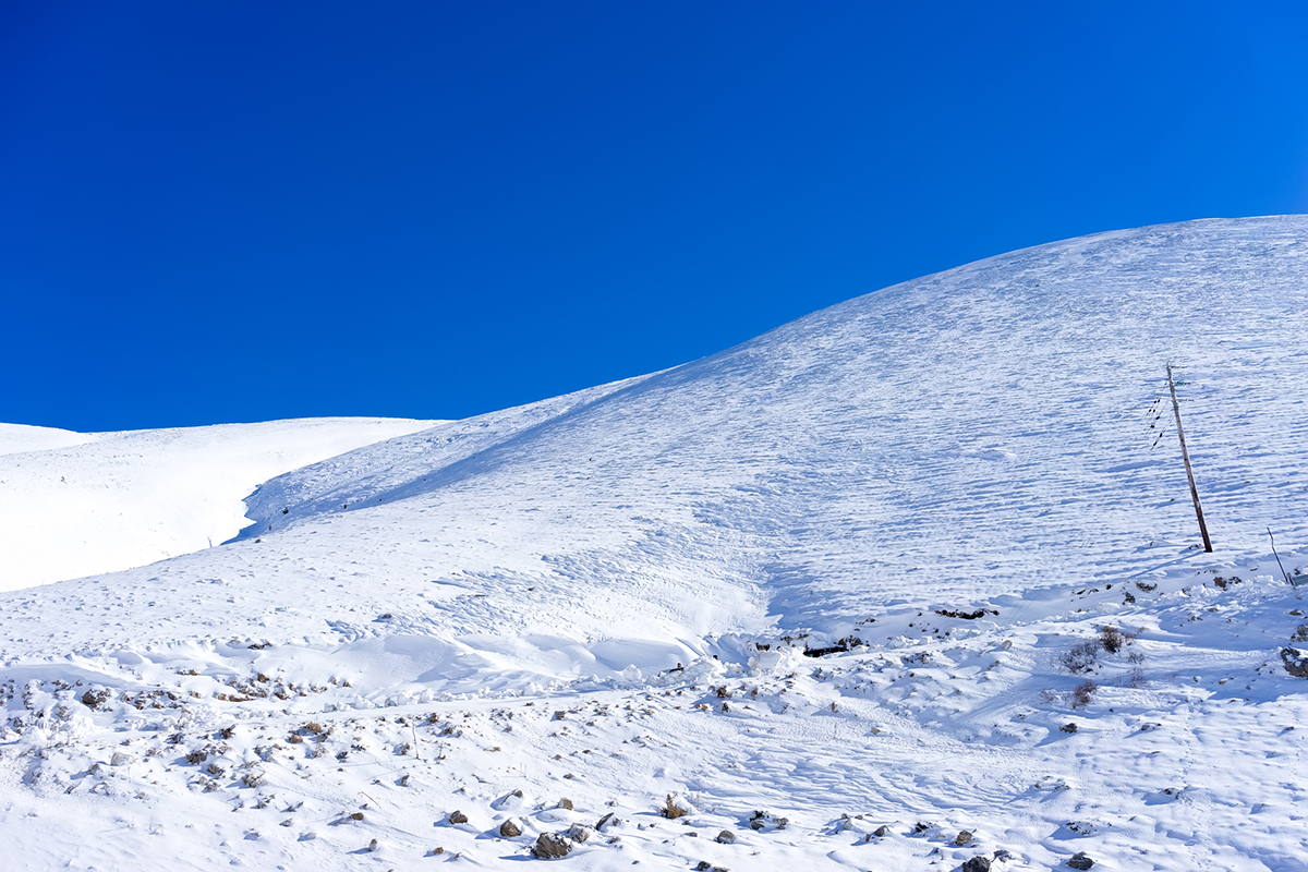 Aerial View of snowed mountain Falakro, in Greece.